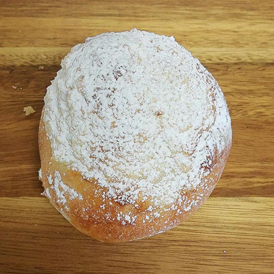 Brioche Bun topped with Custard